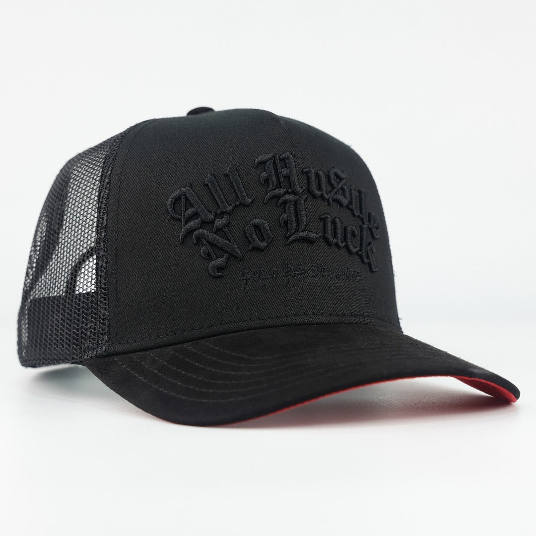 4. ALL HUSTLE NO LUCK BLACK SUELA ROJA TRUCKER (pre-order)